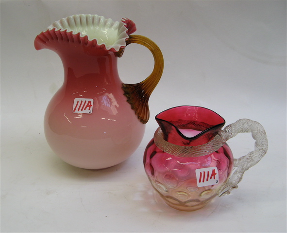 Appraisal: TWO AMERICAN ART GLASS ITEMS Peachblow bulbous pitcher deep rose