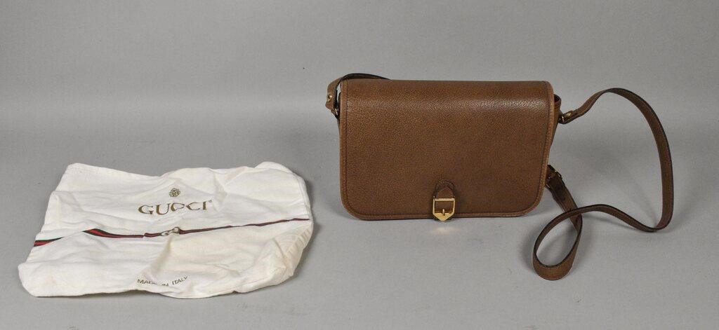 Appraisal: Brown leather flap bag with gold tone hardware single adjustable