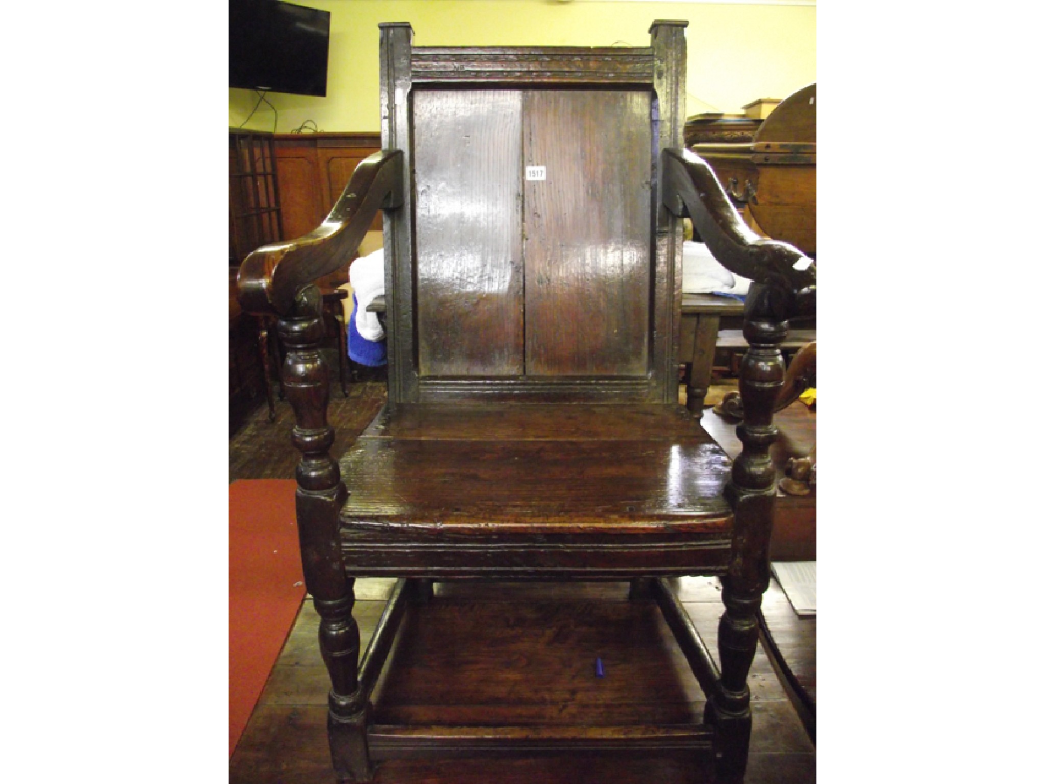 Appraisal: A late th century oak wainscot chair with panelled back