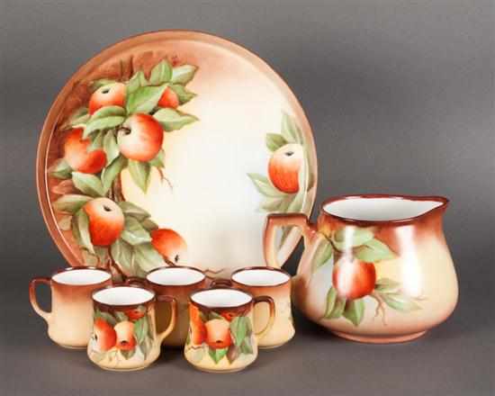 Appraisal: Limoges paint decorated porcelain -piece cider set early th century