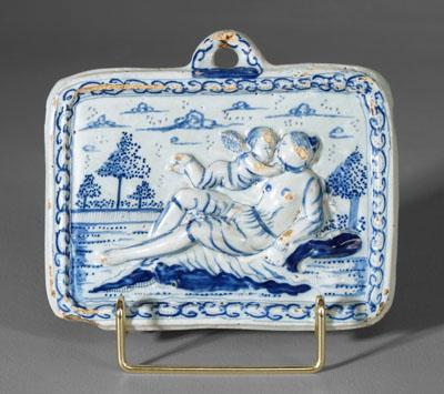 Appraisal: Delft wall tablet reclining figure with cupid in exterior setting