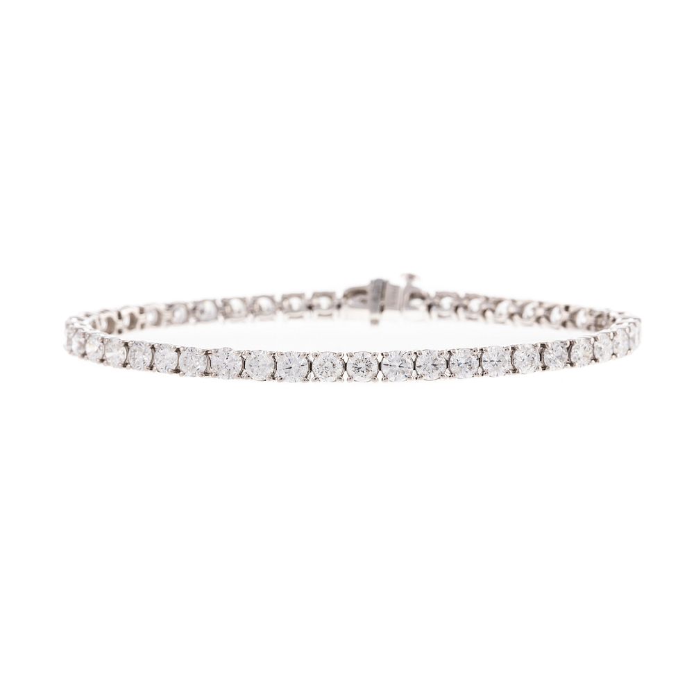 Appraisal: An ctw Diamond Tennis Bracelet in Platinum Platinum bracelet featuring