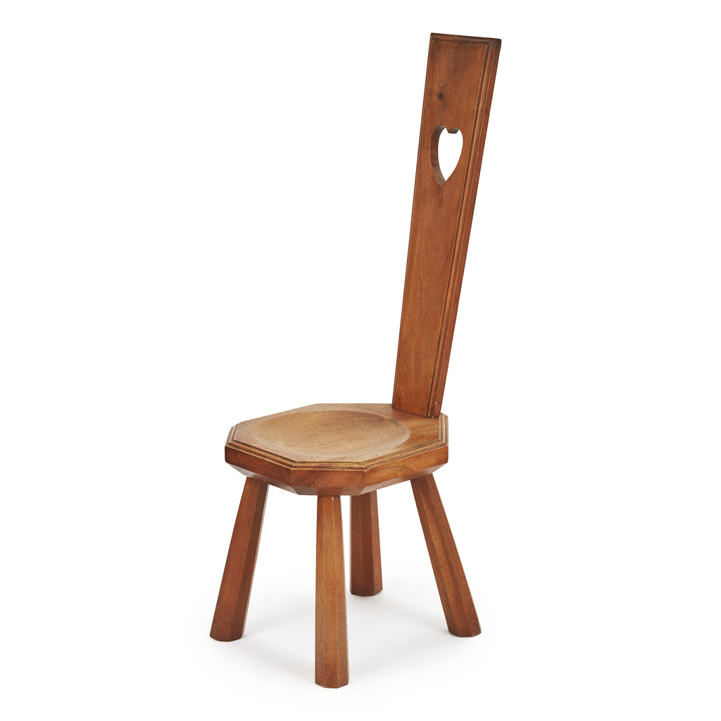 Appraisal: COTSWOLD SCHOOL OAK SPINNING CHAIR S the tall back with