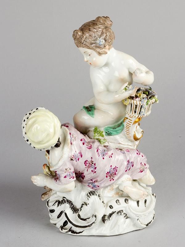 Appraisal: A porcelain group A porcelain group with two child symbolizing