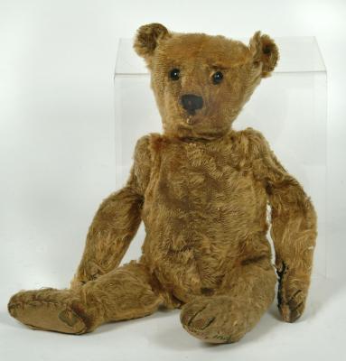 Appraisal: A Steiff teddy bear c straw filled covered in worn