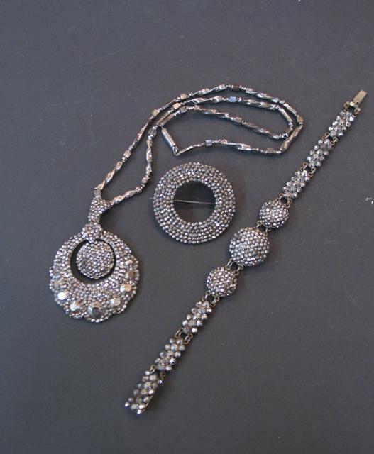 Appraisal: A QUANTITY OF PAVE-SET CUT-STEELWORK ITEMS including brooches and a