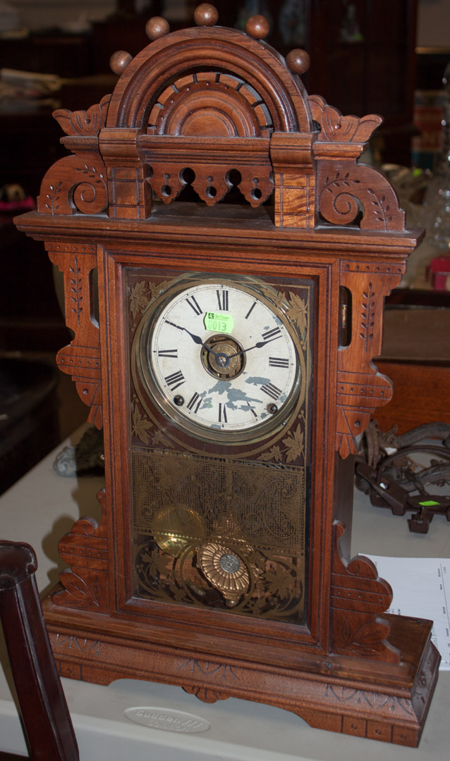 Appraisal: Walnut gingerbread clock