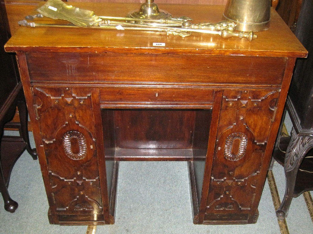 Appraisal: Carved oak kneehole desk