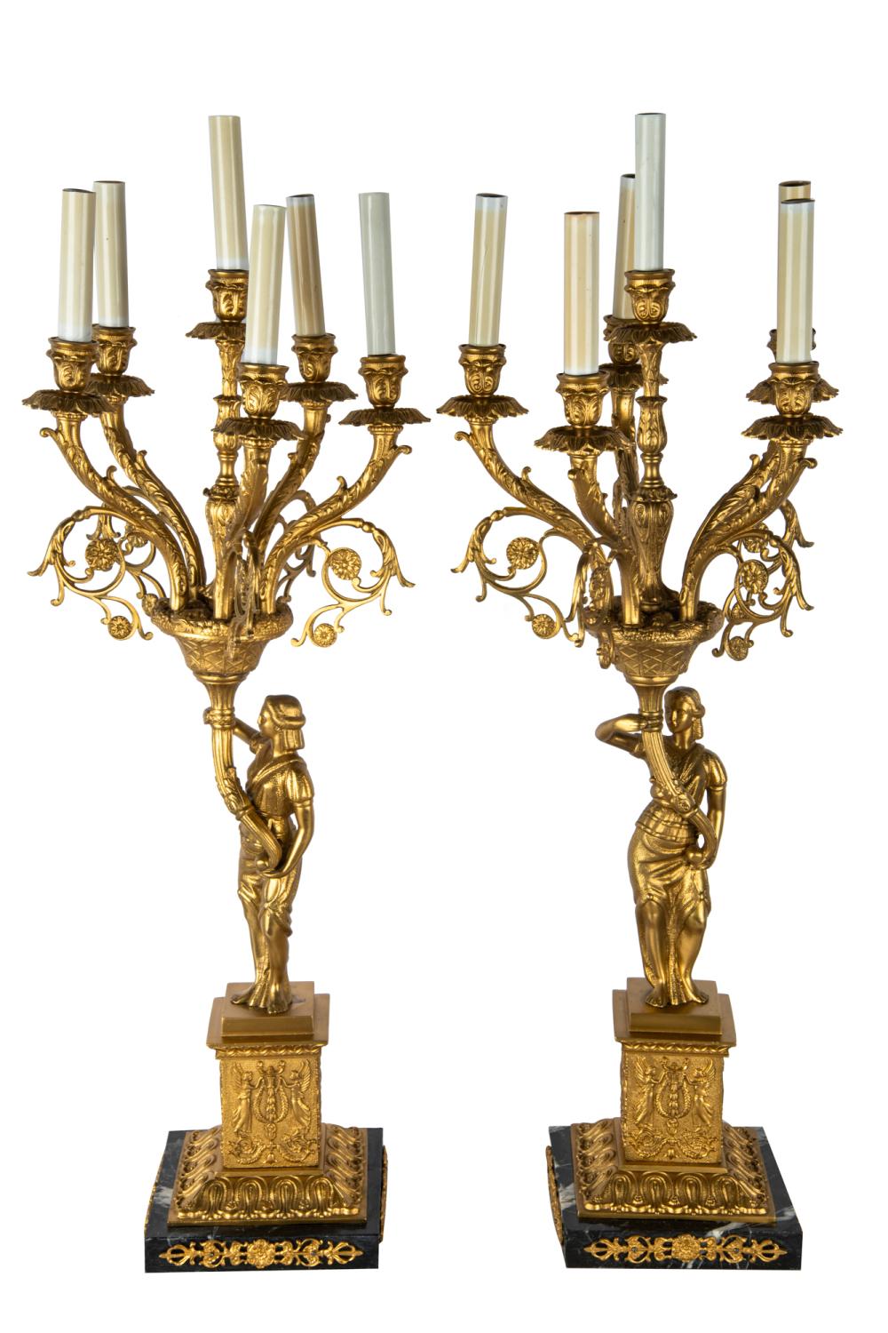 Appraisal: PAIR OF GILT BRONZE SIX-LIGHT FIGURAL CANDELABRAmodern each on a