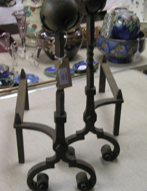 Appraisal: A pair of andirons with spherical finials and spiral columns