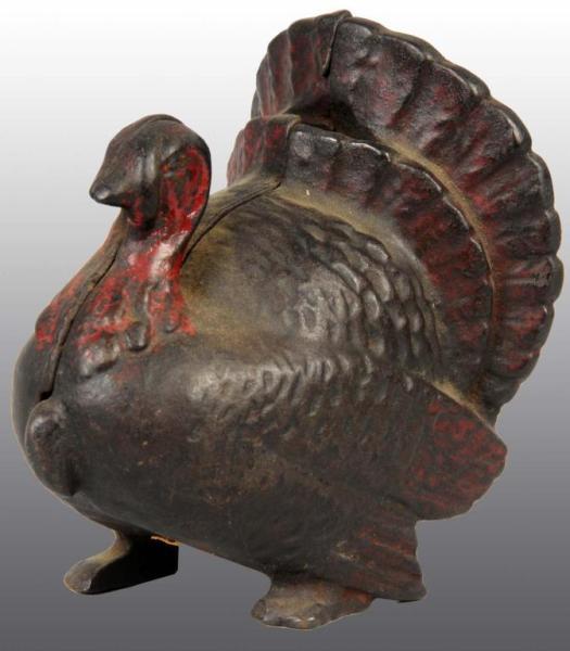 Appraisal: Small Cast Iron Turkey Still Bank Description Manufactured by A