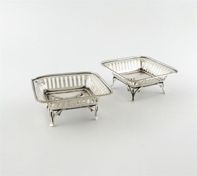 Appraisal: A pair of silver bonbon dishes by William Hutton and