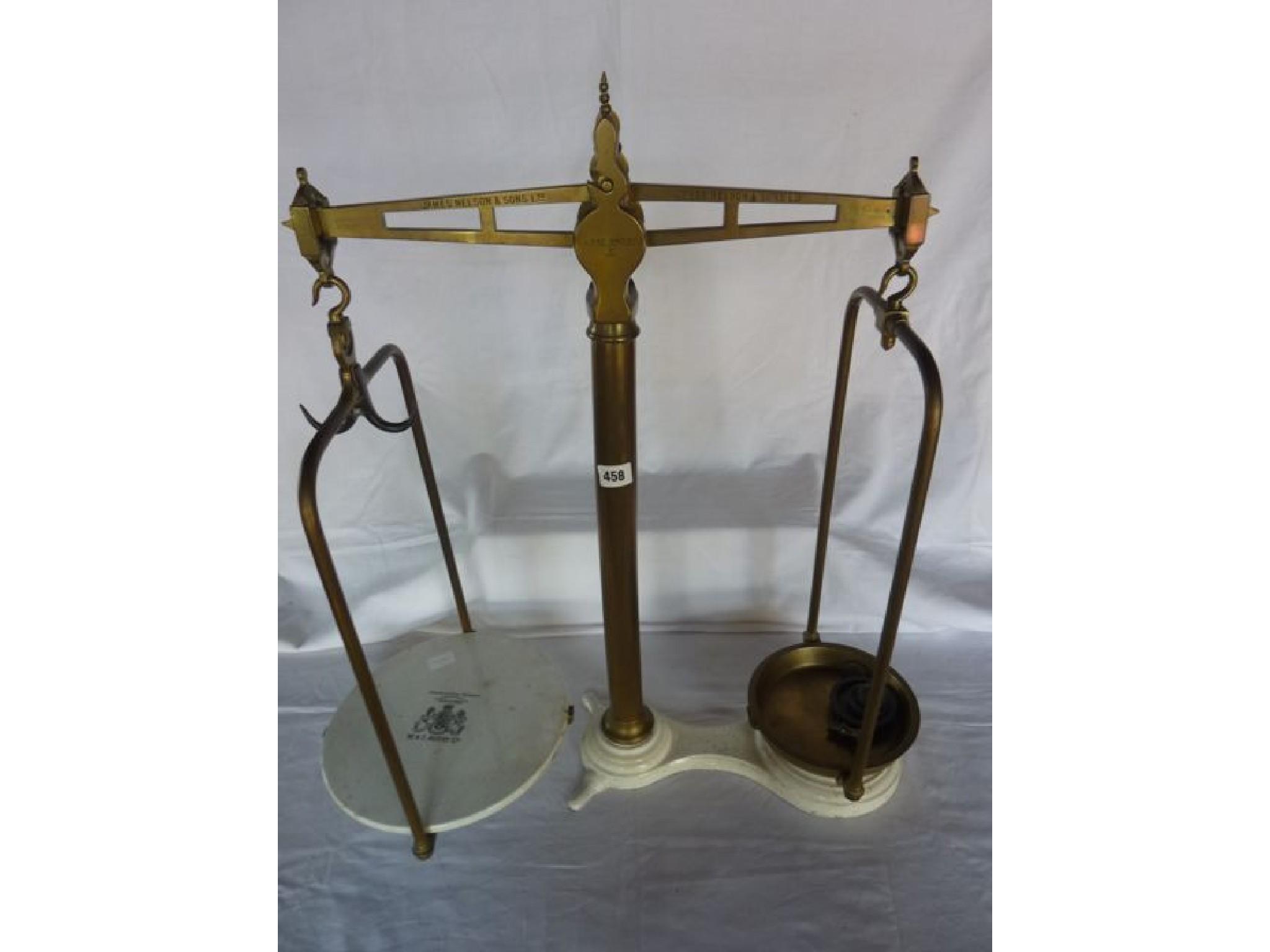 Appraisal: A set of large brass and iron shop counter balance