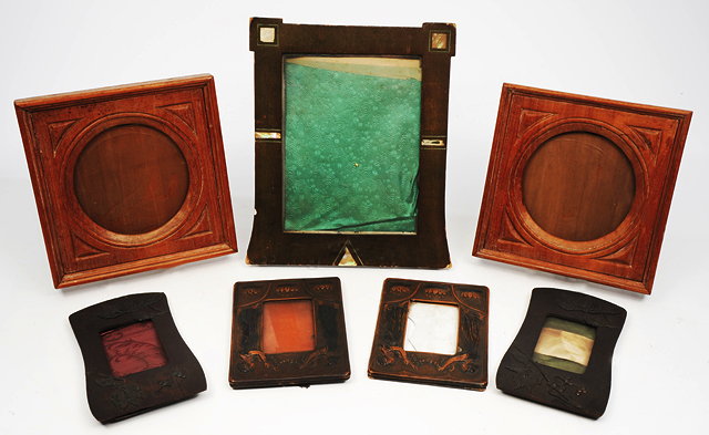 Appraisal: A PAIR OF ART NOUVEAU EMBOSSED LEATHER PHOTOGRAPH FRAMES decorated