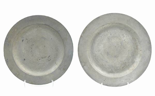 Appraisal: A group of four large pewter chargers diameter of largest