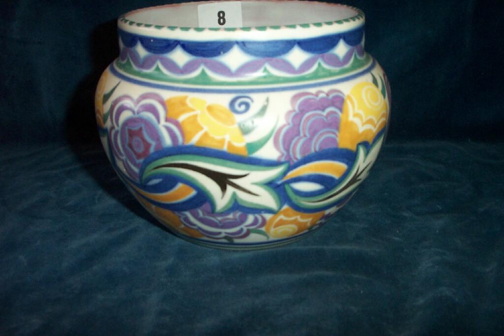 Appraisal: A Poole pottery jardiniere with painted stylised floral and leaf