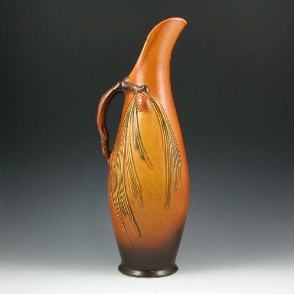 Appraisal: Tall Roseville Pine Cone ewer in brown Marked Roseville USA