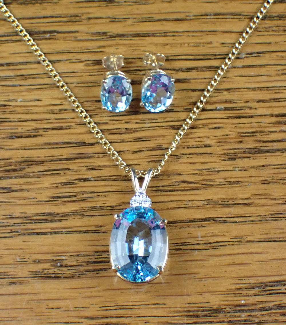 Appraisal: BLUE TOPAZ PENDANT NECKLACE AND EAR STUD SET including a