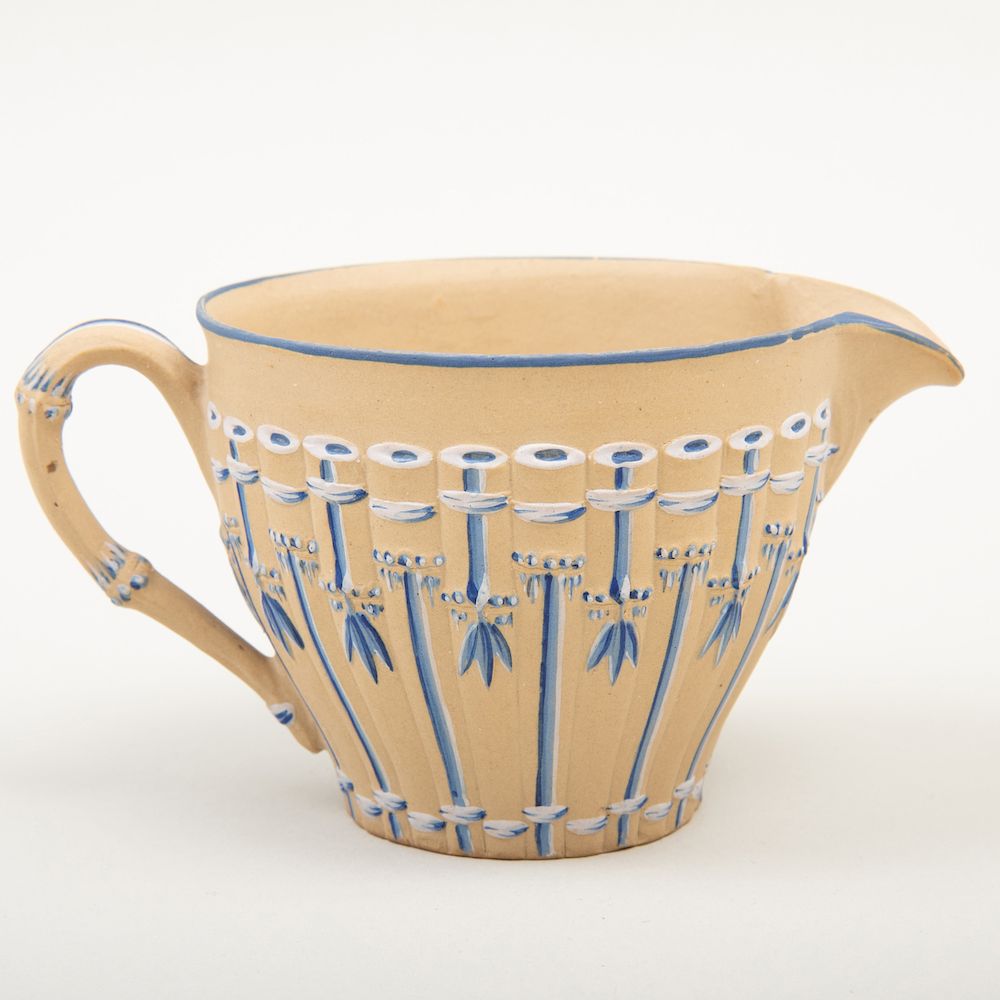 Appraisal: Wedgwood Caneware Milk Jug Impressed lowercase mark molded and enamelled