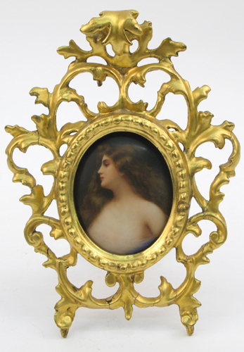 Appraisal: A BERLIN MINIATURE PORCELAIN OVAL PORTRAIT the bust of a