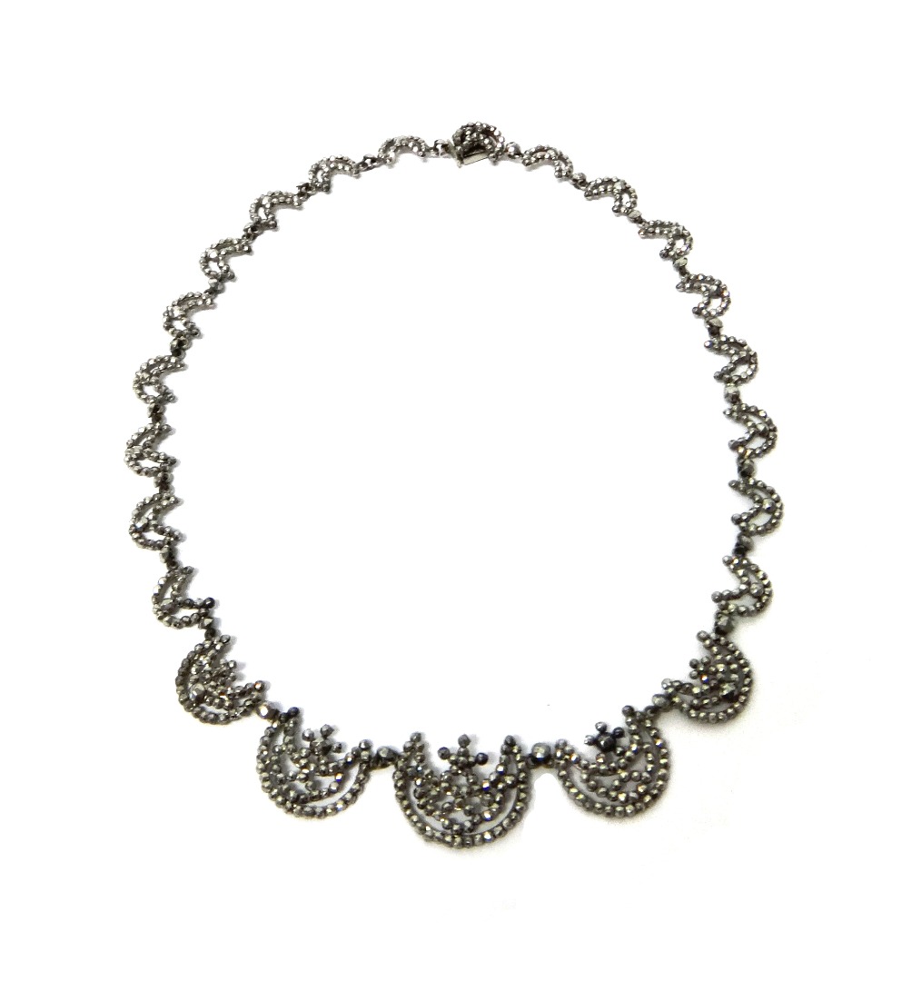 Appraisal: A Victorian cut steel necklace the principal links at the