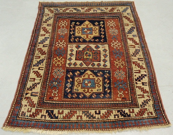 Appraisal: - Fine colorful Kazak oriental carpet with three center geometric