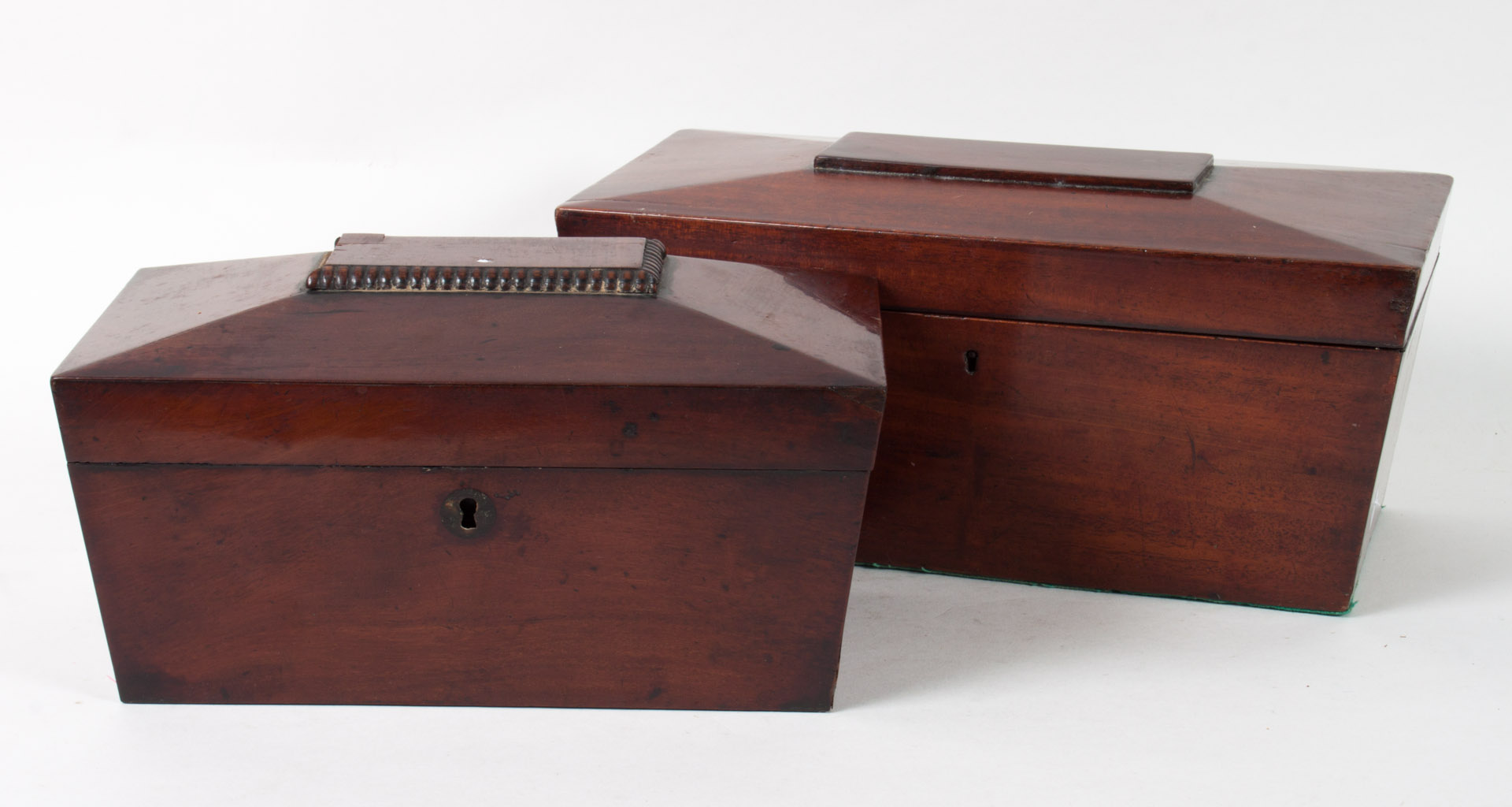 Appraisal: Two Regency sarcophagus mahogany tea caddies circa in H in