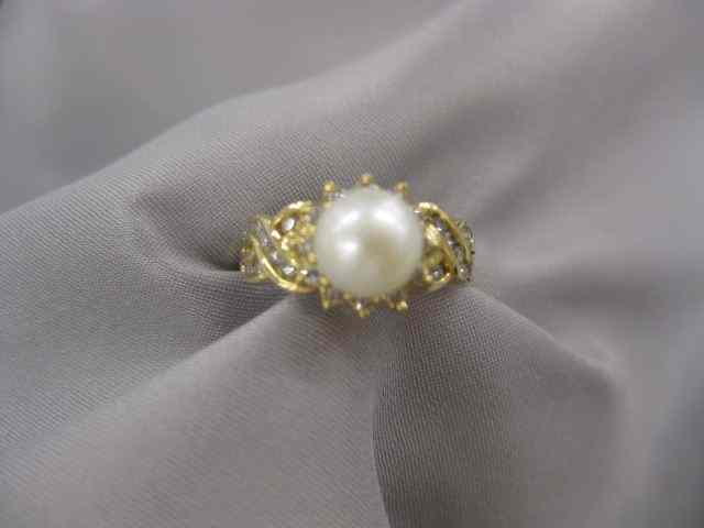 Appraisal: Pearl Diamond Ring Lustrous mmpearl surrounded by diamonds in k