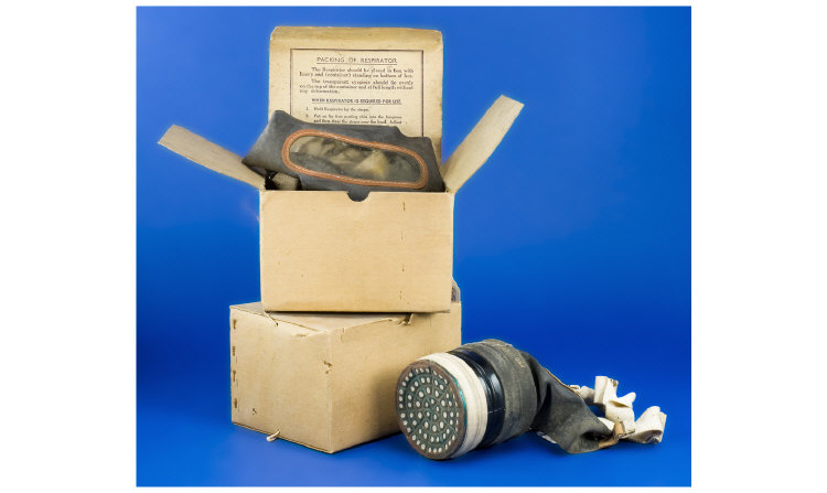 Appraisal: Three World War II Gas Masks Two in original boxes