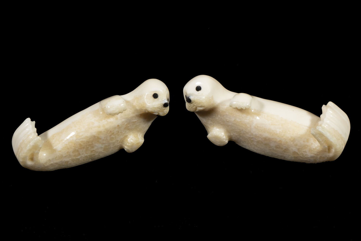 Appraisal: INUIT SCULPTURES OF SEAL PUPS BY BERT OOZEVASEUK - Yu'pik