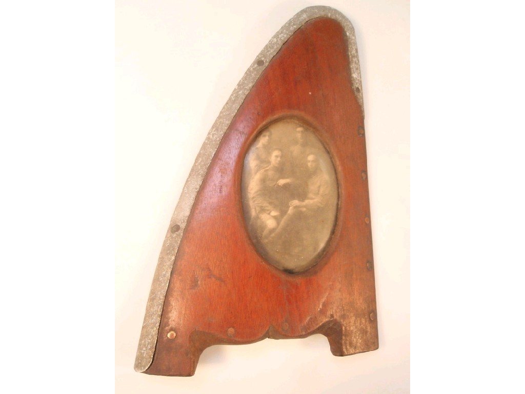 Appraisal: An aluminium wrapped propeller blade tip carved to form a