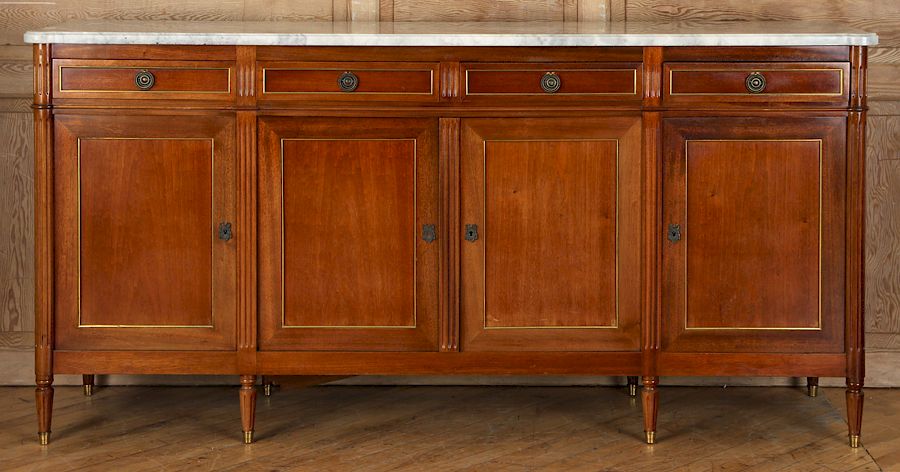 Appraisal: FRENCH MAHOGANY MARBLE TOP SIDEBOARD C A French mahogany Louis