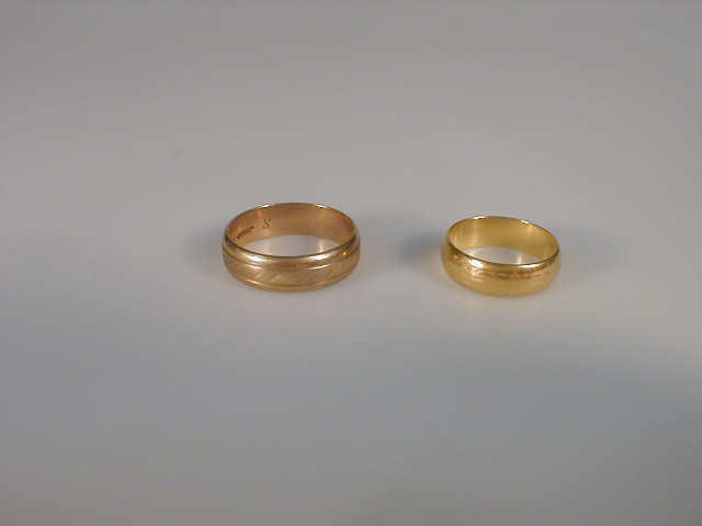 Appraisal: A ct gold wedding band and a ct gold band