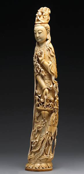 Appraisal: A large pieced and tinted ivory figure of Guanyin First