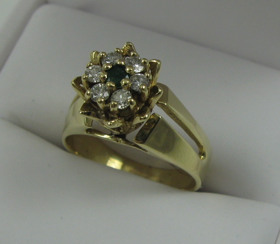 Appraisal: EMERALD DIAMOND AND FOURTEEN KARAT GOLD RING set with six