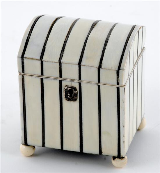 Appraisal: Ivory tea caddy hinged cover over paneled body resting on