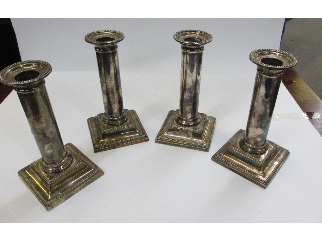 Appraisal: Set of four silver plated candl