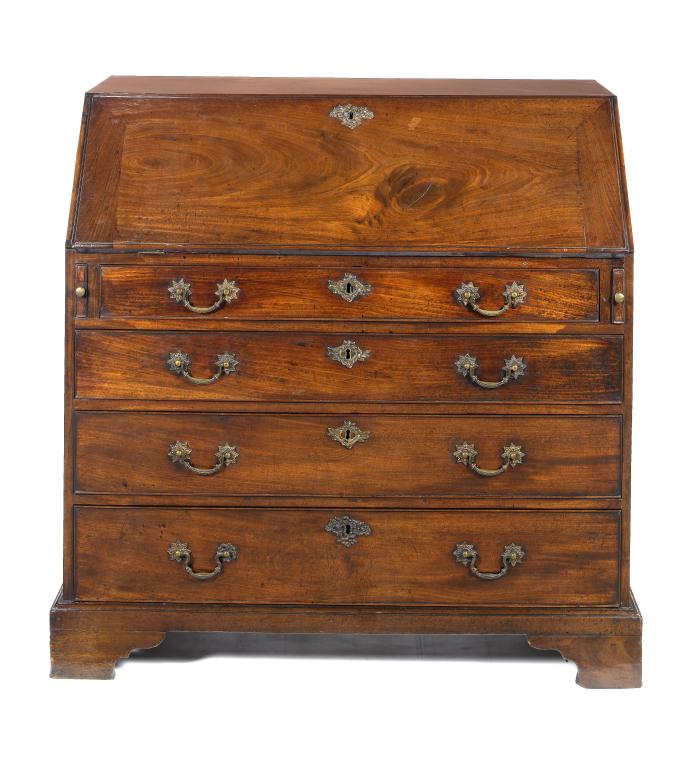 Appraisal: A GEORGE III MAHOGANY BUREAU the fitted interior centred by