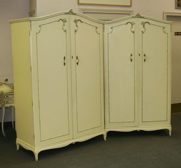 Appraisal: Pair French style armoires original painted surface breakdown construction fitted