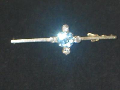 Appraisal: AN AQUAMARINE AND DIAMOND BROOCH the round cut aqua set