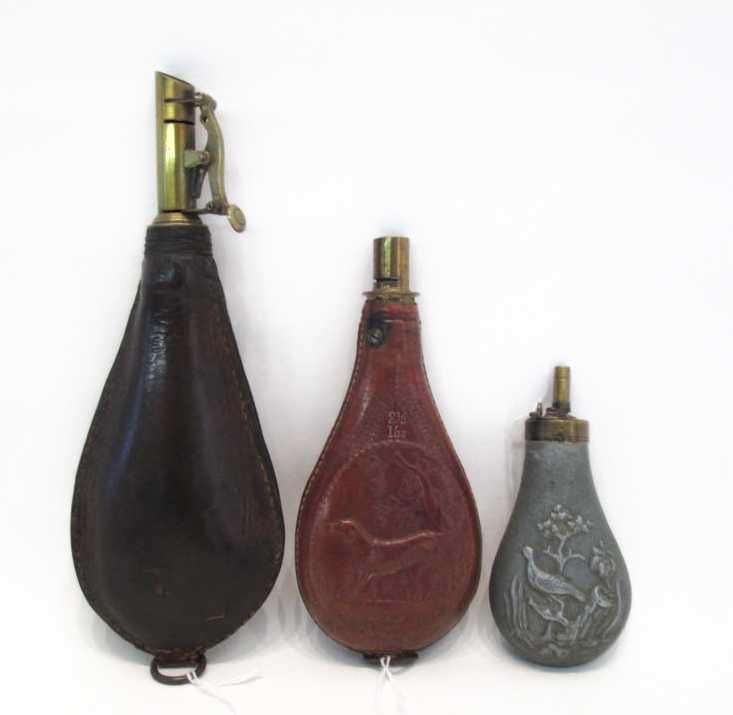 Appraisal: LOT OF THREE small nineteenth century powder flask with bird