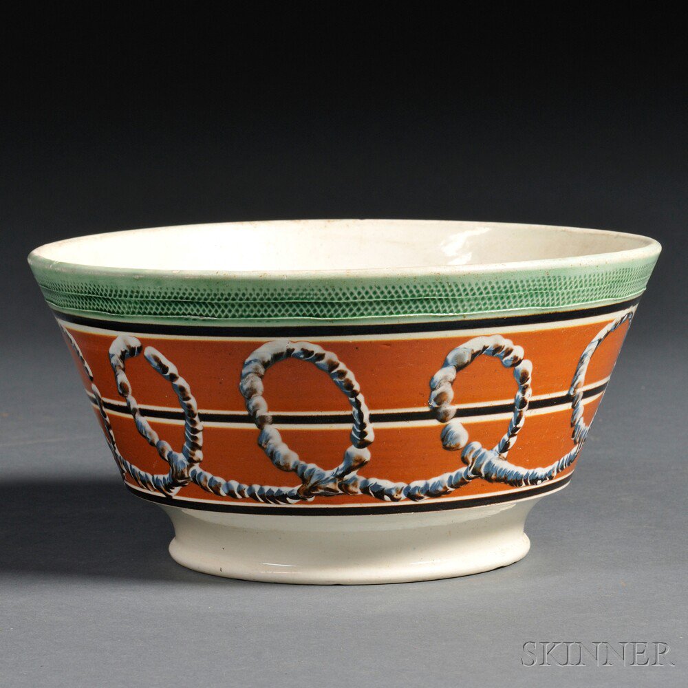 Appraisal: Mochaware Bowl with Earthworm Slip Decoration Britain early th century