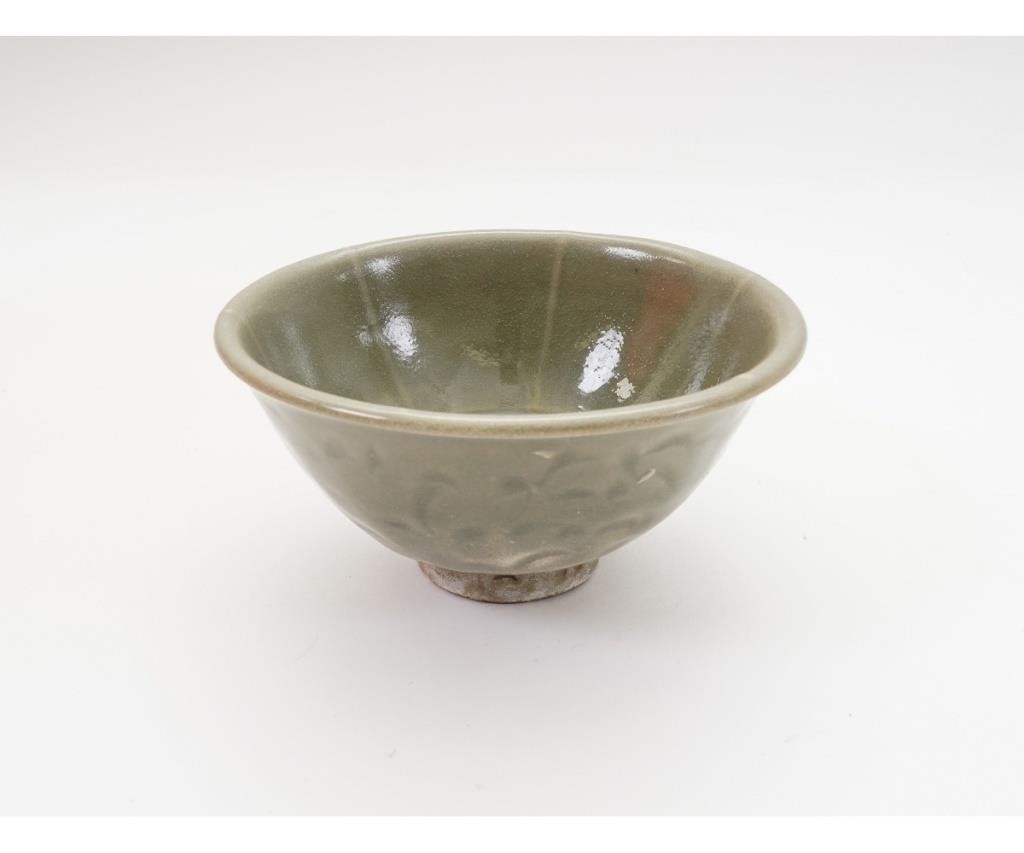 Appraisal: Chinese celadon dark green bowl with leafy decorations Northern Song