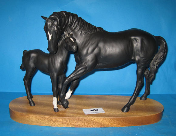 Appraisal: Beswick Connoissuer Black Beauty and Foal on wood stand A