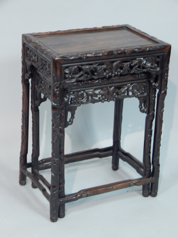 Appraisal: A nest of two early thC Chinese hardwood tables each