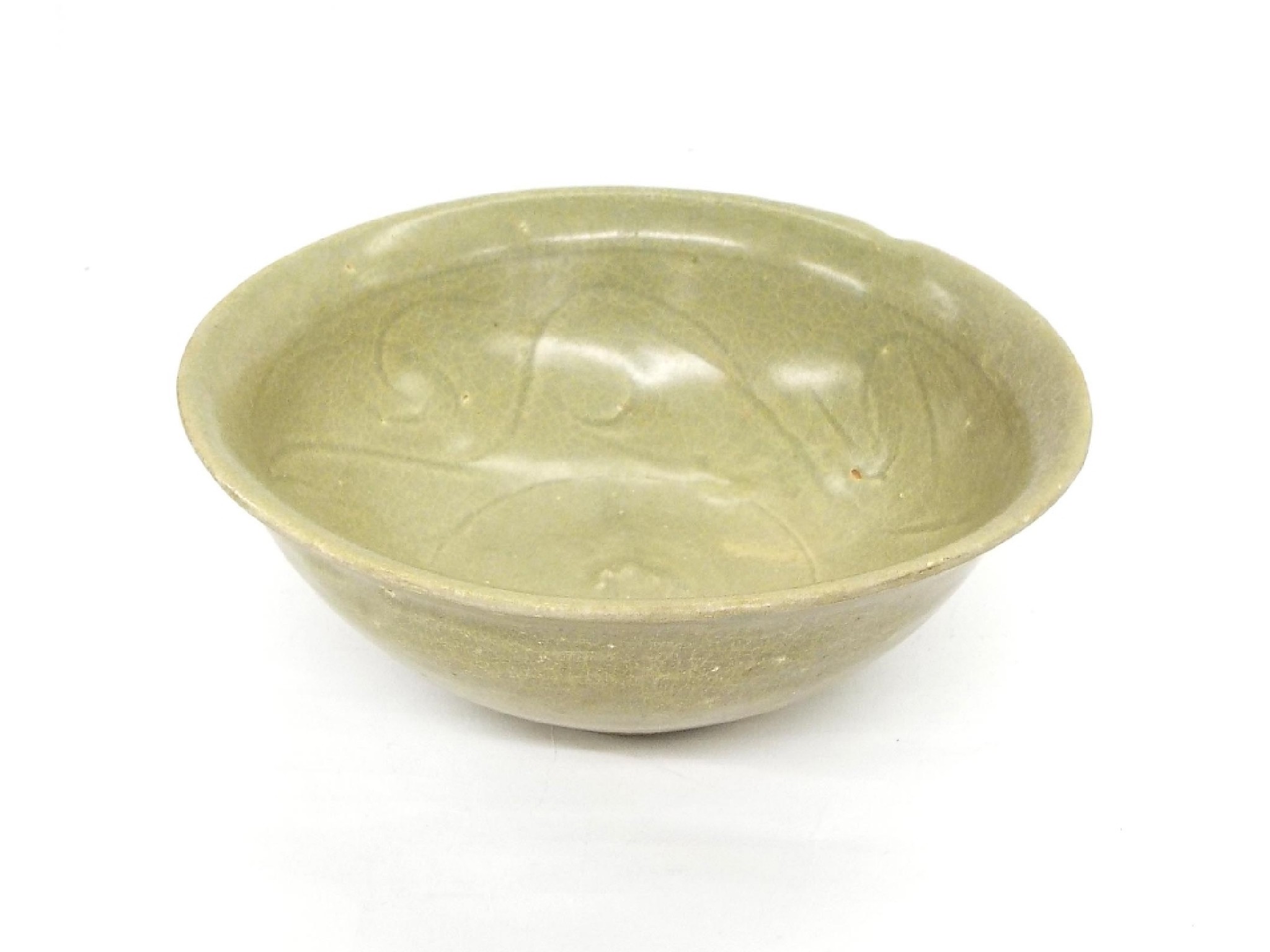 Appraisal: Antique Chinese celadon porcelain bowl with incised scrolled decoration to