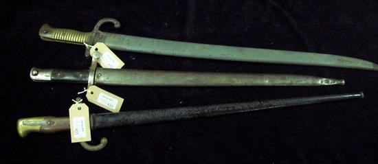 Appraisal: Three French bayonets each inscribed and dated with scabbards