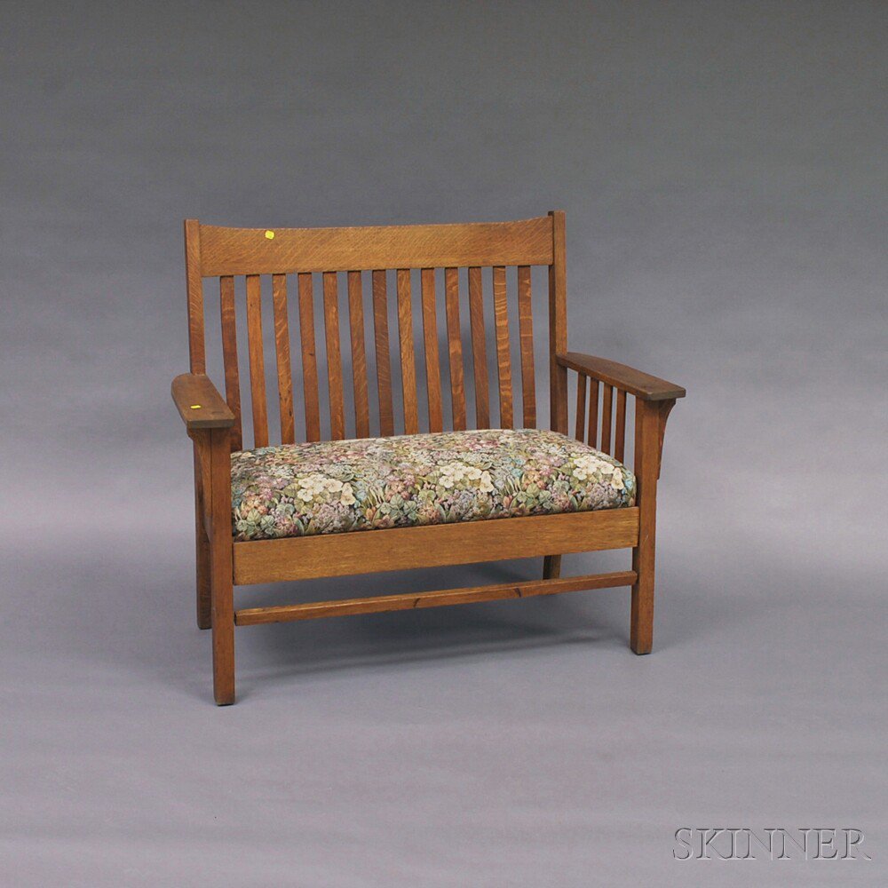 Appraisal: Mission Oak Settee th century with floral-pattern upholstered cushion ht