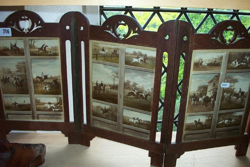 Appraisal: An Edwardian oak framed table top -fold divider with fretted