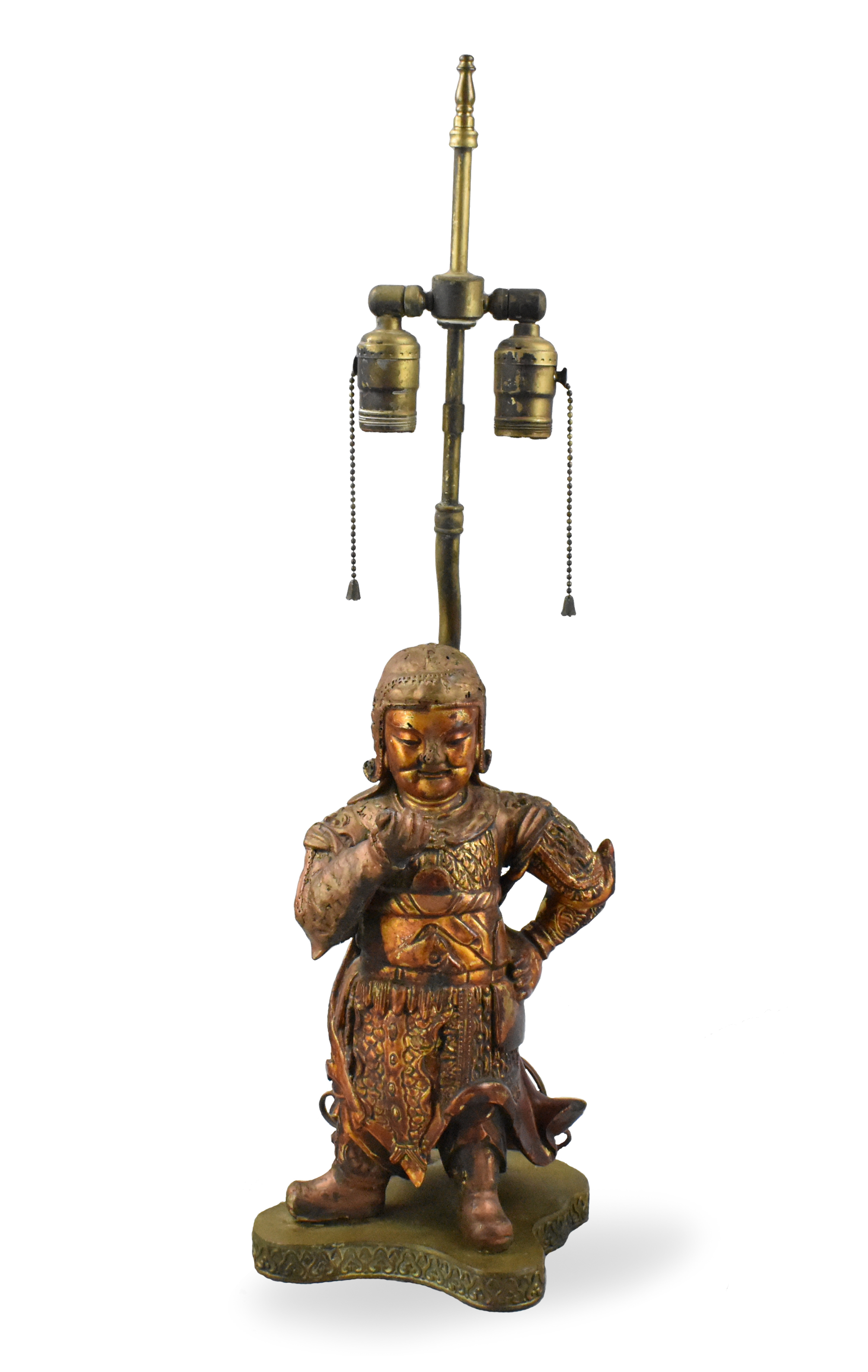 Appraisal: A Chinese gilt lacquered carved wood guardian dating from the